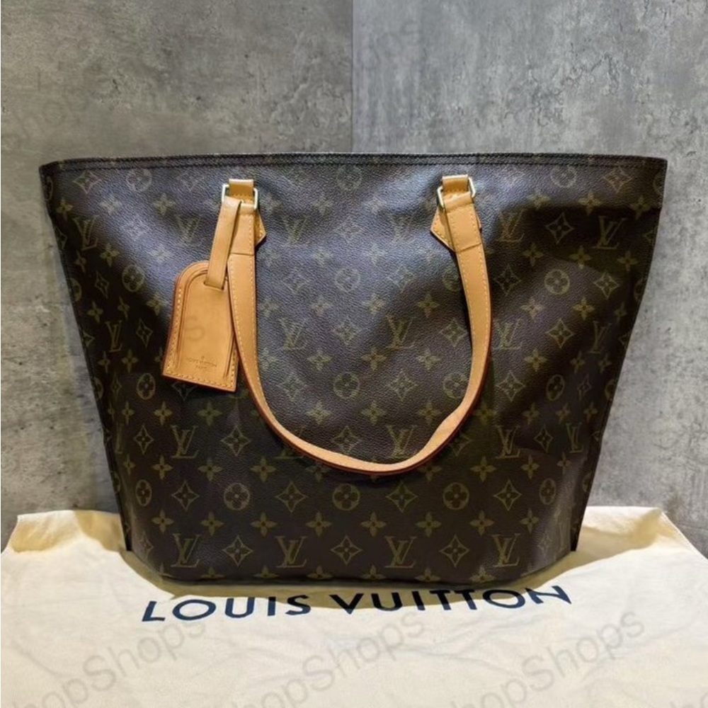 Louis Vuitton All in one Tote. 
Microchipped.